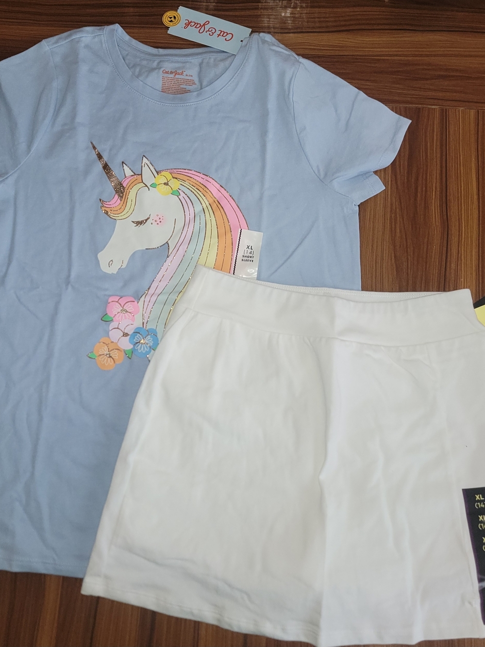 Cat & Jack Light Blue Tee with White Art Class Skort and Pastel Rainbow Unicorn